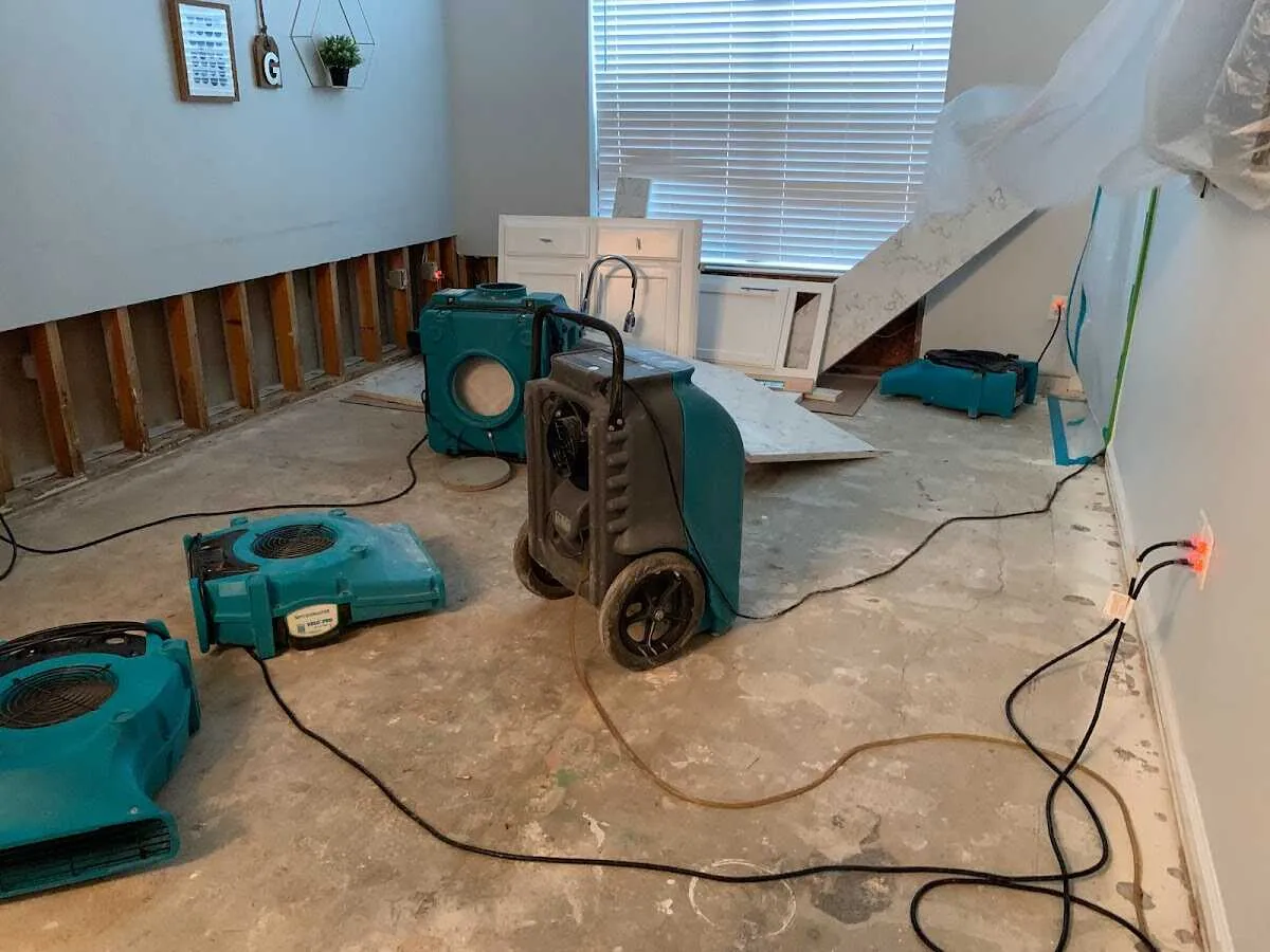 Dehumidifier in flood-cut room for Water Damage Restoration in Palmetto Estates